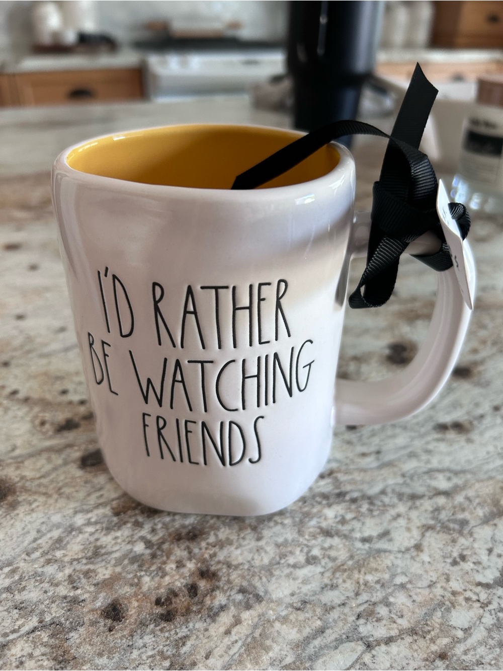 Rae Dunn White Ceramic Mug with Yellow Interior and Black Text